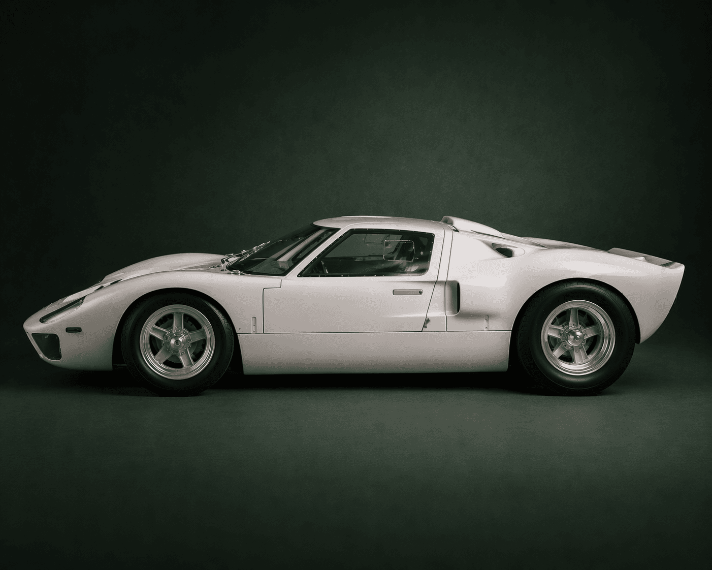 Classic racing car in a studio.